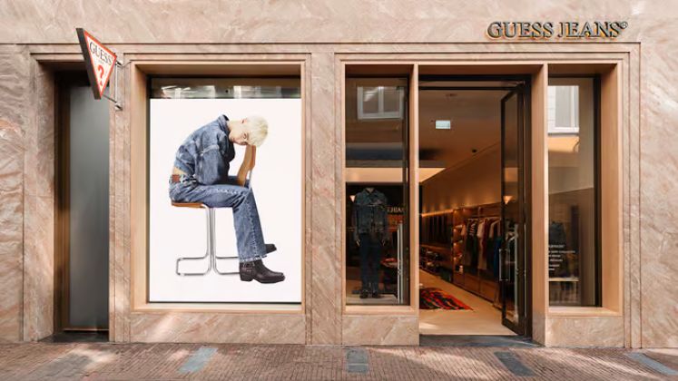 Guess earnings decline, adjusts outlook to reflect 'softer consumer environment'